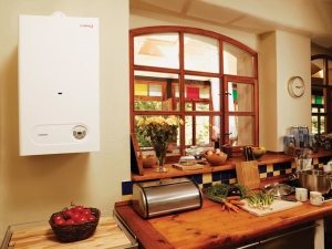 Настенный электрический котел не занимает много места и удобен в эксплуатации Настенный электрический котел не занимает много места и удобен в эксплуатации