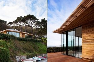 Небольшой каркасный дом с окнами от пола до потолка Небольшой каркасный дом с окнами от пола до потолка