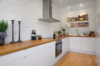 Листовые стеновые панели с имитацией каменной поверхности в оформлении кухни Листовые стеновые панели с имитацией каменной поверхности в оформлении кухни