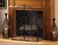 Кованая небольшая ширма прекрасно дополнит камин в гостиной Кованая небольшая ширма прекрасно дополнит камин в гостиной