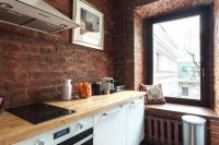 Кухня в квартире оформлена в стиле лофт Кухня в квартире оформлена в стиле лофт