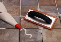 Для экономии смеси затирки, можно использовать кондитерский мешок и небольшой шпатель Для экономии смеси затирки, можно использовать кондитерский мешок и небольшой шпатель