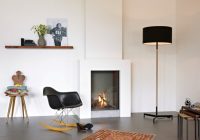 Конструкцию из гипсокартона можно оборудовать электрическим камином, который выглядит как настоящий Конструкцию из гипсокартона можно оборудовать электрическим камином, который выглядит как настоящий