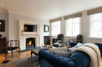 Пример классического оформления камина в гостиной Пример классического оформления камина в гостиной