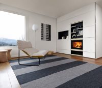 Встраиваемый камин можно разместить в нише из гиспокартона или мебельном гарнитуре Встраиваемый камин можно разместить в нише из гиспокартона или мебельном гарнитуре